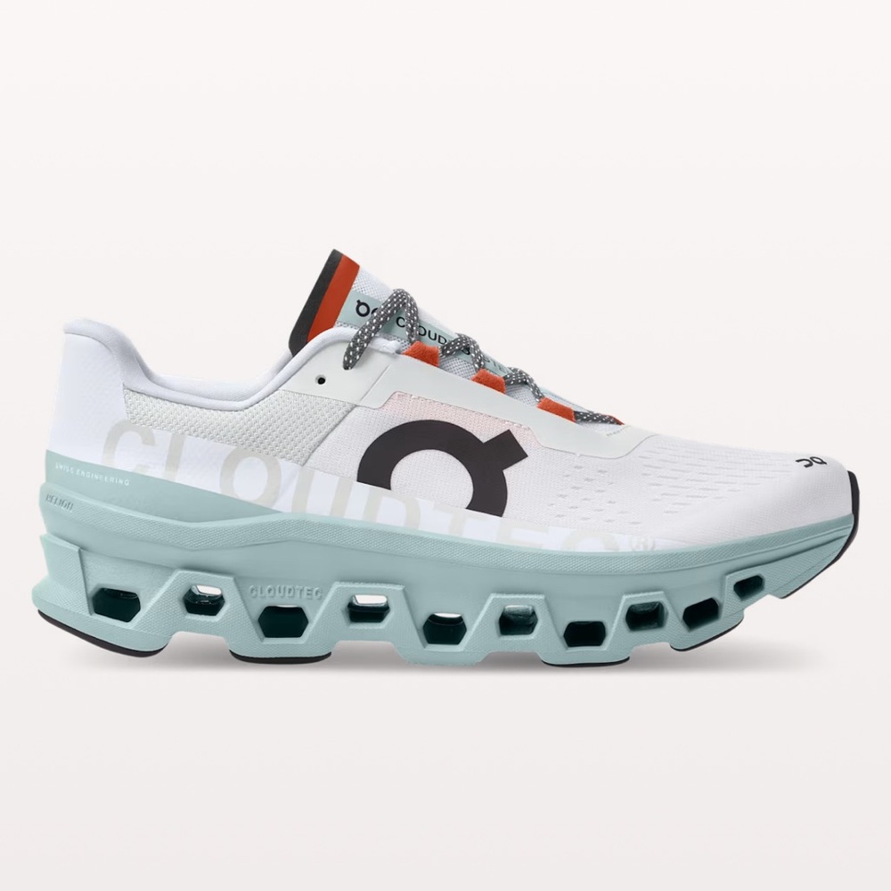 On Running White and Green Athletic Shoes with Breathable Upper